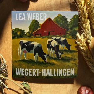 Poetry Slam Heft „Wegert-Hallingen“ von Lea Weber mit Covermotiv einer Wiese mit Kühen