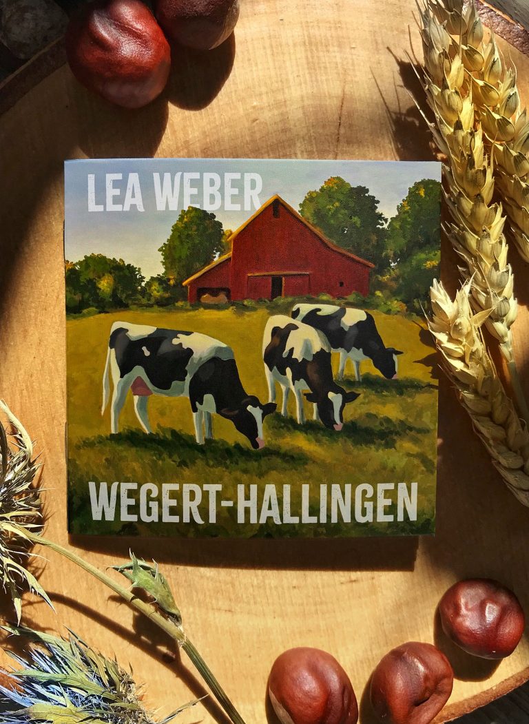 Poetry Slam Heft „Wegert-Hallingen“ von Lea Weber mit Covermotiv einer Wiese mit Kühen